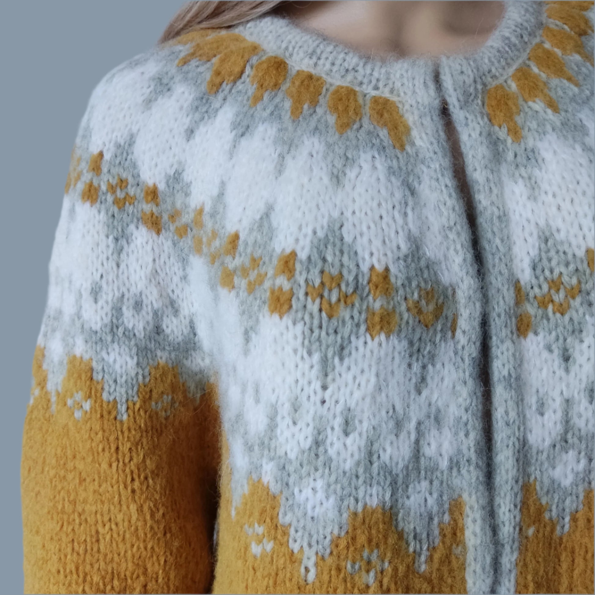 A mustard yellow and gray patterned sweater Jacket with Frog Snaps Closure