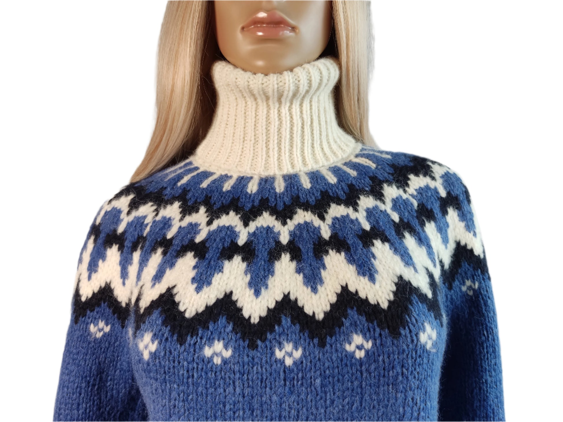 Hand-knitted blue oversized unisex Scandinavian Lopapeysa sweater with a chunky-knit white and navy Nordic round yoke, featuring a double crew neck, white ribbed cuffs, and hem, made from soft hypoallergenic baby alpaca and merino wool.