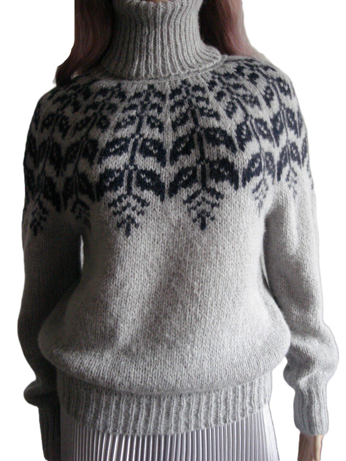 Gray sweater with black leaf pattern on a white background