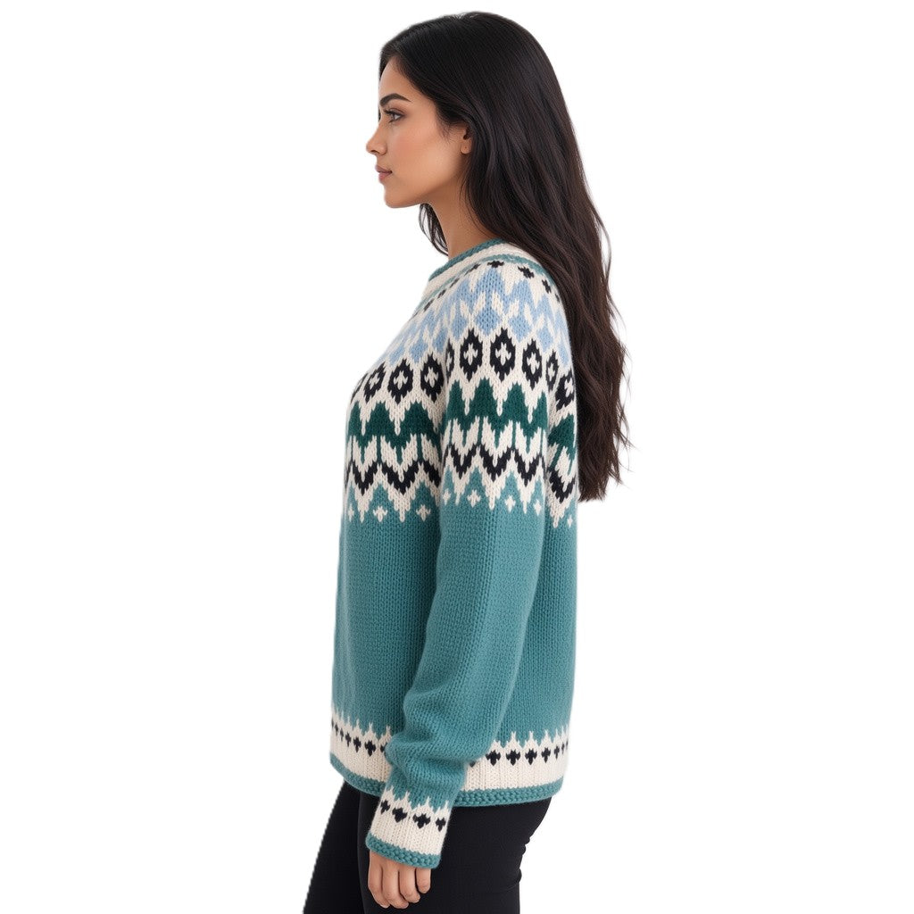 A woman shown from the side profile wearing a teal, white, and black Fair Isle knit sweater against a plain white background.