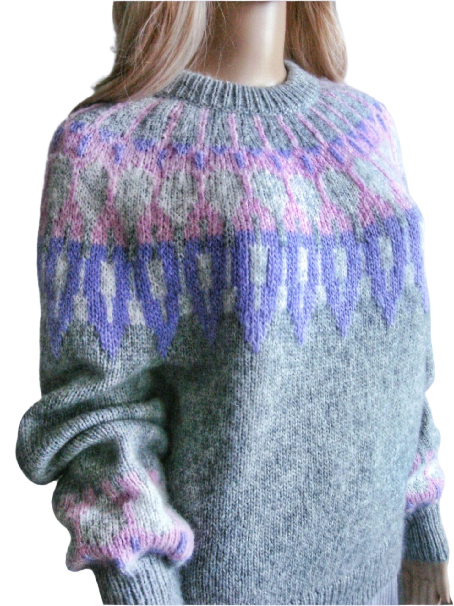Hand-knitted women’s Scandinavian Lopapeysa sweater in Gray, featuring a harmonizing Lilac & Pink Nordic round yoke, with ribbed hem, cuffs, and double crew collar in Gray, made from soft hypoallergenic baby alpaca and merino wool.