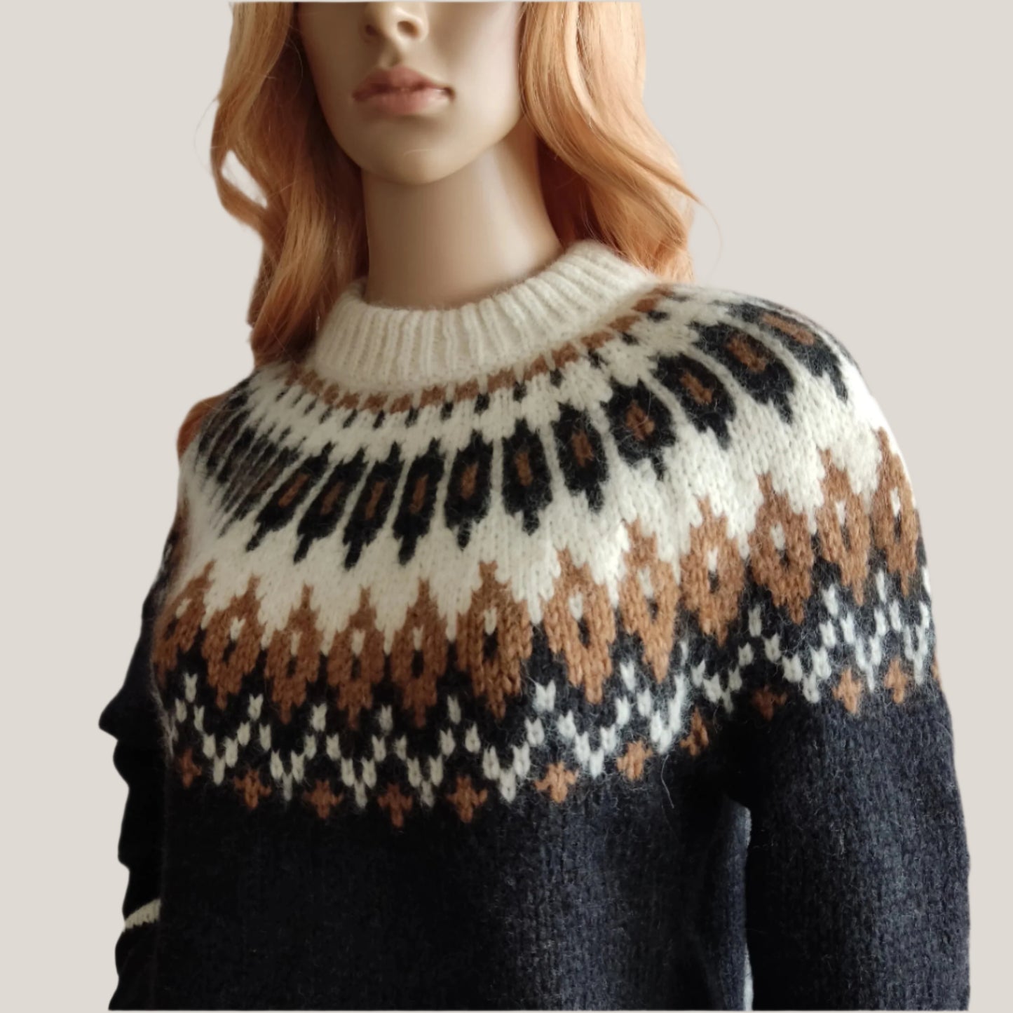 Hand-knitted black oversized unisex Scandinavian Lopapeysa sweater with a Nordic round yoke in white and taupe, featuring white ribbed cuffs, collar, made from soft hypoallergenic baby alpaca and merino wool.