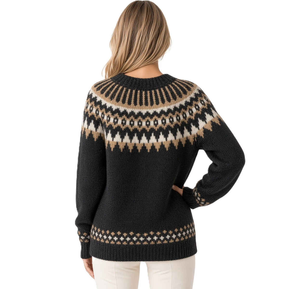 A woman shown from the back wearing a black knit sweater with a beige and cream Fair Isle pattern across the shoulders, upper back, and hem, paired with off-white pants, against a plain white background.