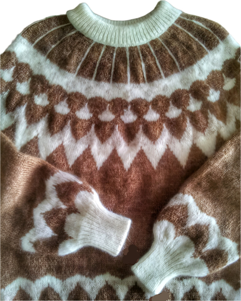 Close-up of a brown and white patterned sweater